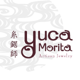 「Yuca Morita」のロゴ